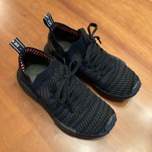 All black NMD’s Adidas